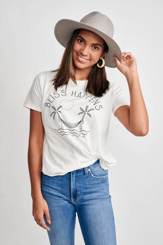 girl in jeans and bliss happens graphic tee